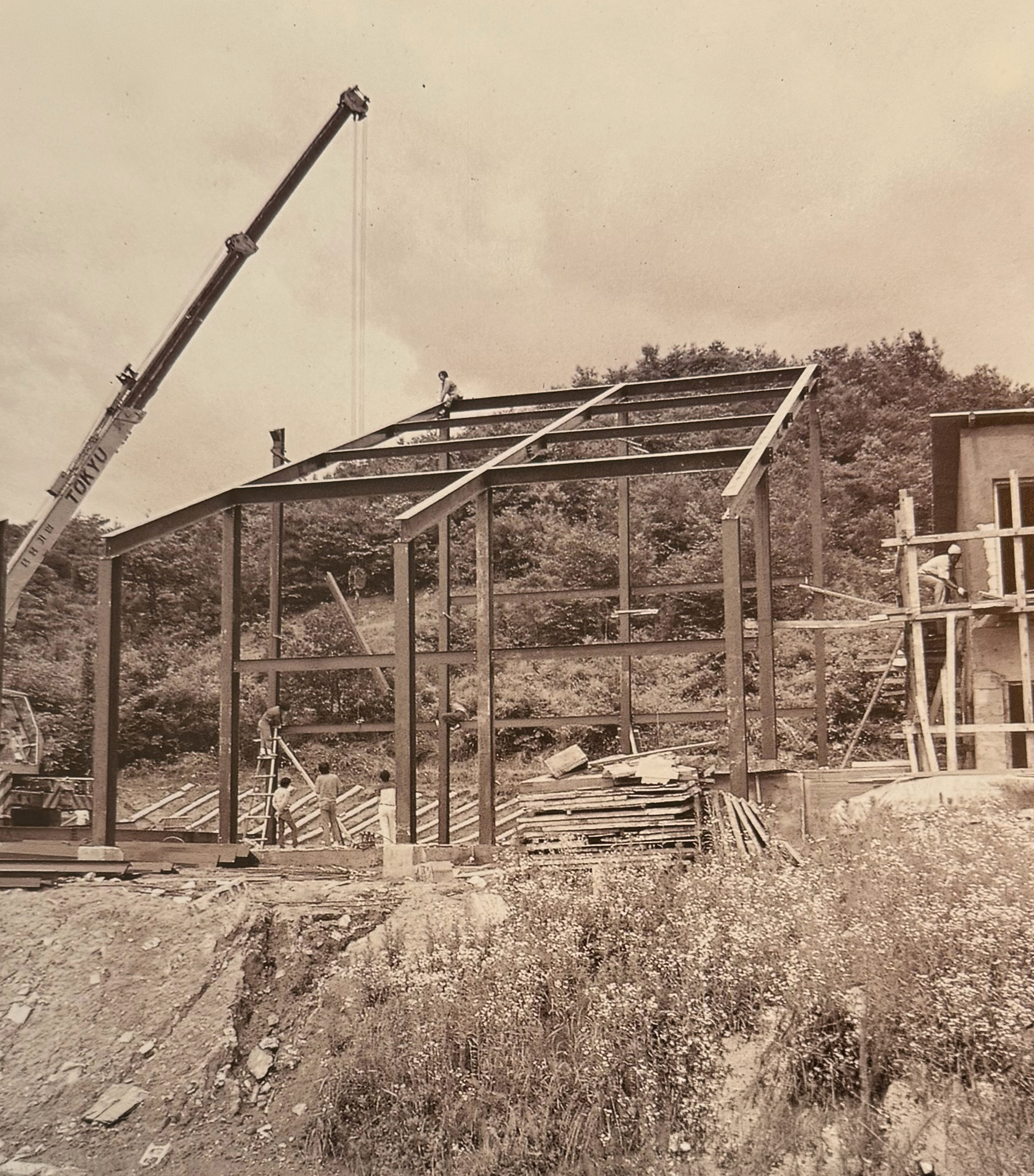 The original 1980s studio building, set into the Yongin forest.